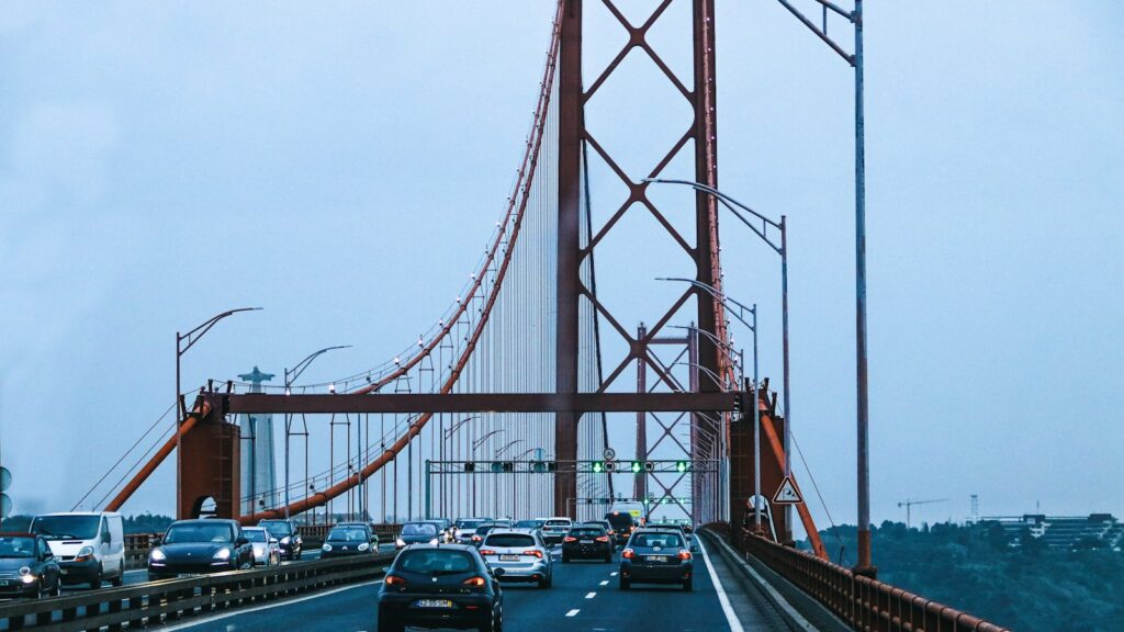 Cars driving across the 25 de Abril Bridge in Lisbon, Portugal