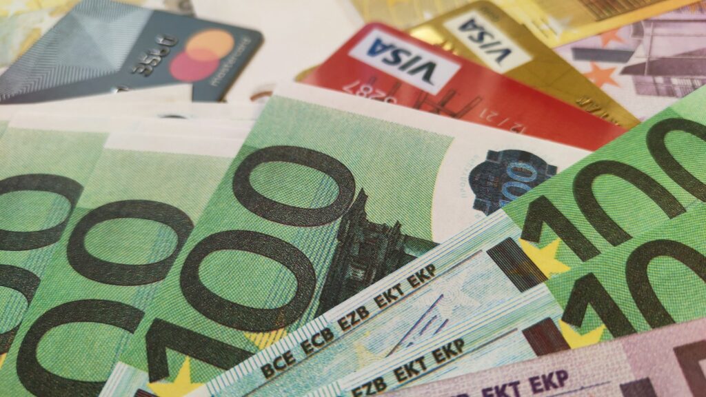 Euro banknotes with Visa and Mastercard bank cards