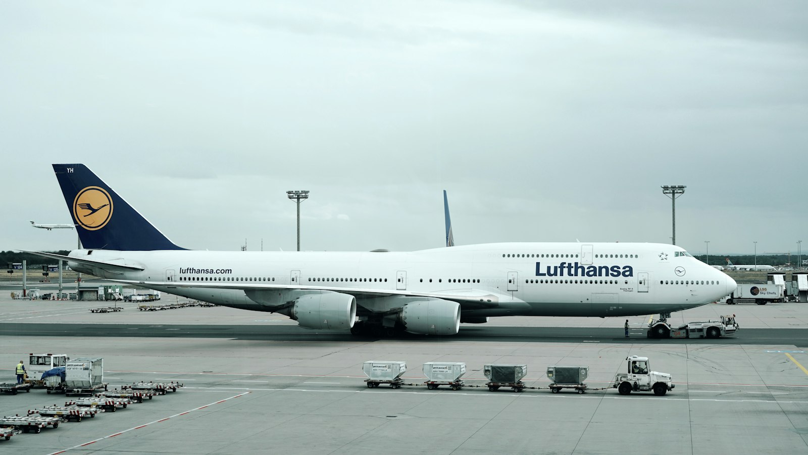 A Lufthansa aircraft at the gate of a German airport