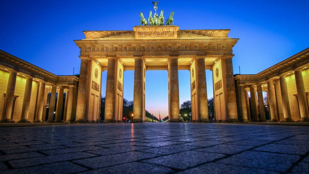 The Brandenburg Gate illuminated at night in Berlin, Germany