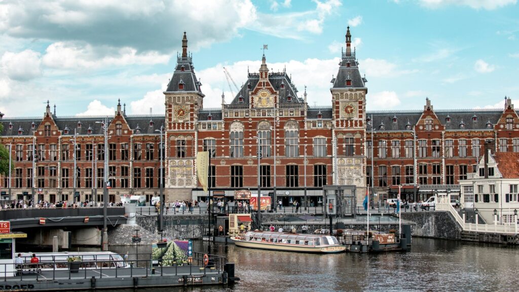 Amsterdam Centraal station seen across the water, the Netherlands