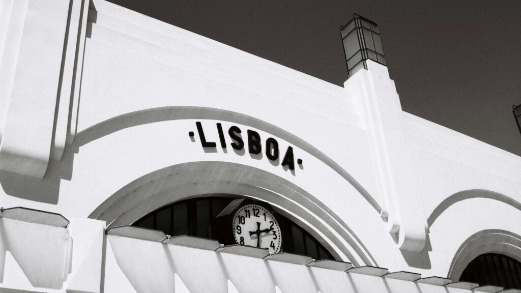 A Lisboa sign on a station building